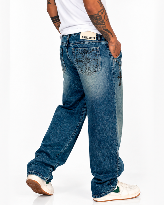 Jean Baggy Azul Verdoso Cruz Bordada con Ojales